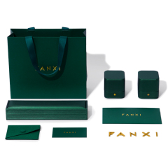Dark green paper jewelry bag with matching ribbon
