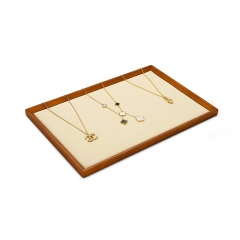 Wooden jewelry display tray with gray beige microfiber