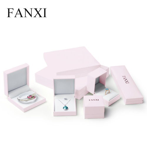 Pink jewelry packaging box with white velvet inside