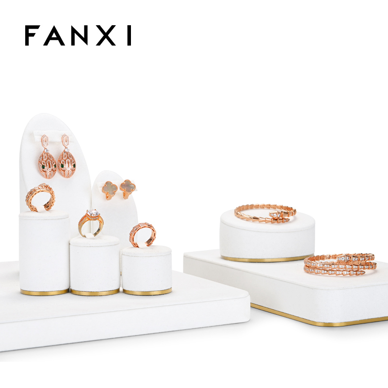 Luxury white jewellery display set with gold metal