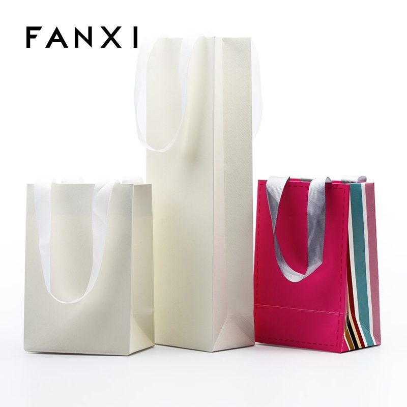 FANXI OEM Wholesale White Paper Pacckaging Bags For Gift Jewelry Cloth Shop Party Favors Custom Printed Paper Shopping Bag