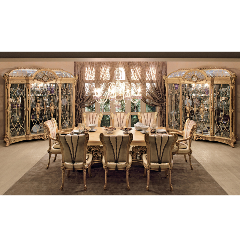 Baroque-style heavily carved dining table creates a distinguished dining experience