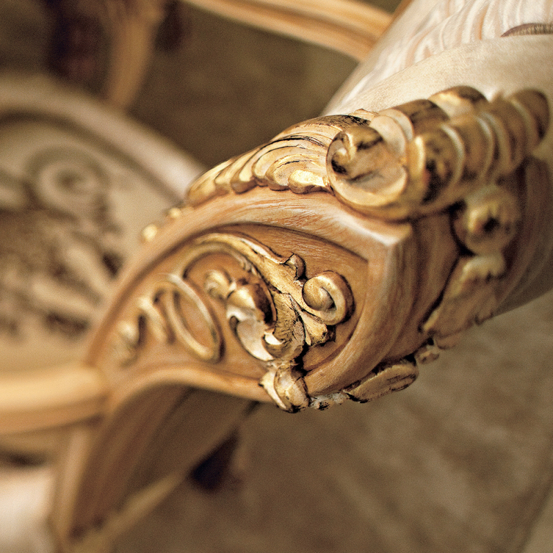 Baroque-style heavily carved dining table creates a distinguished dining experience