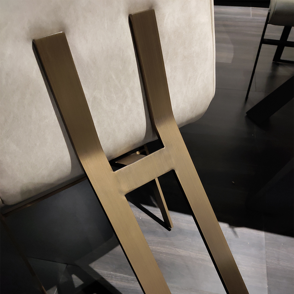 Stainless steel base in copper brushed dining chair