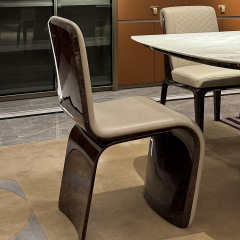 Restaurant dining chair with curved back and curved legs