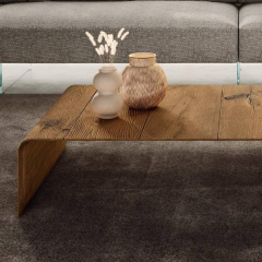 Living room coffee table combining glass and solid wood