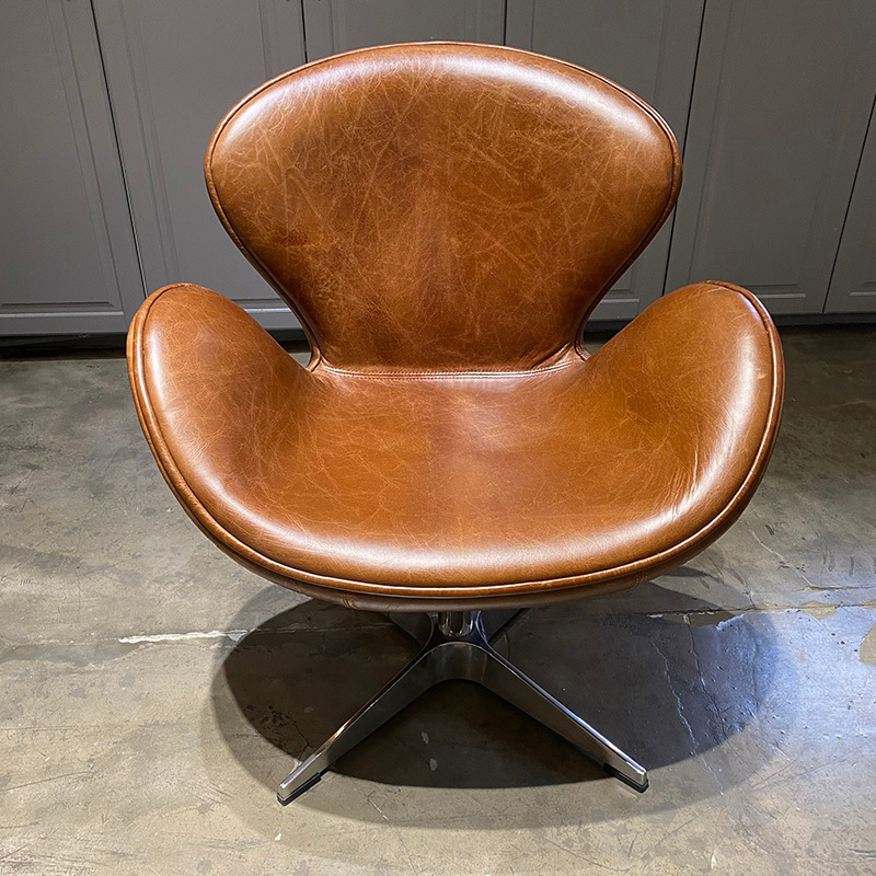 Leather office chair with aluminum frame and base on wheels