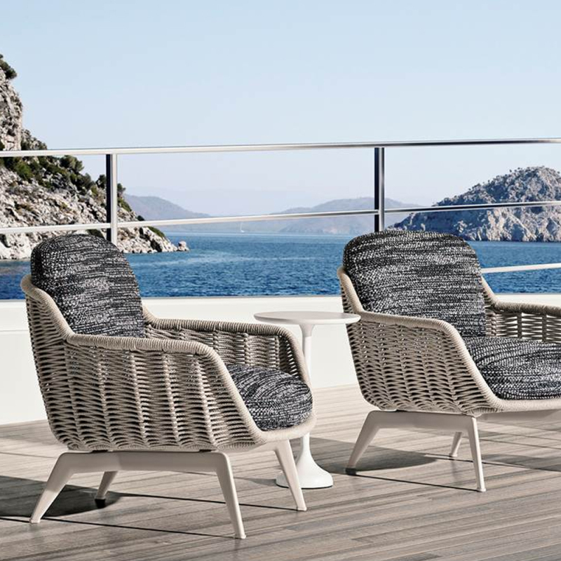 Elegant Rattan Lounge Chair and Ottoman Set for Outdoors