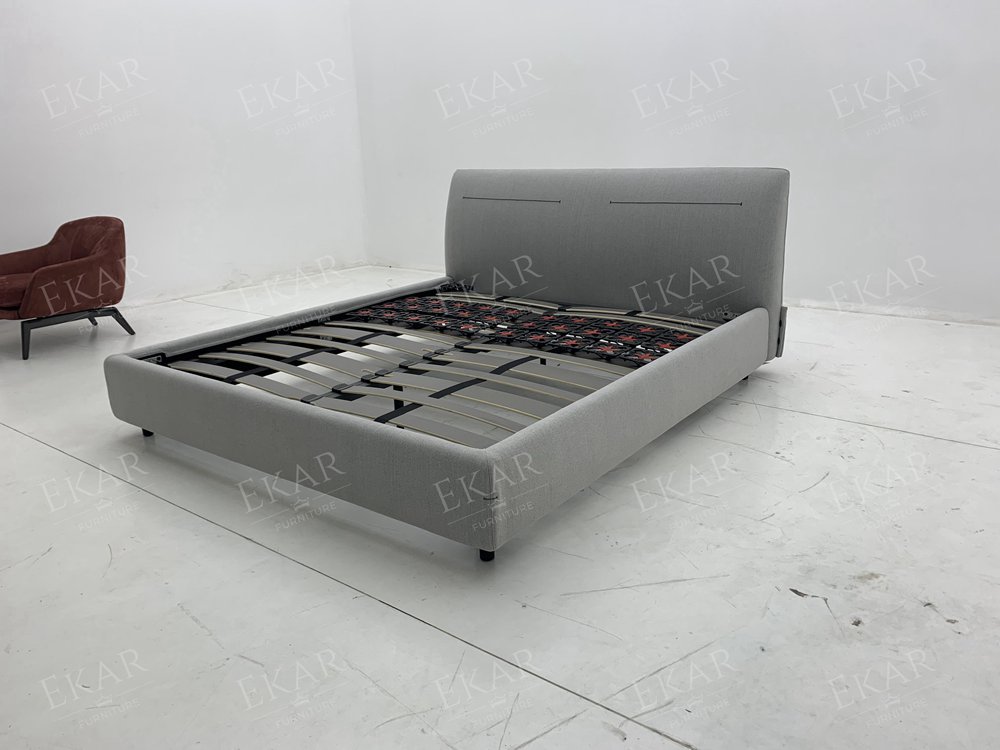 Computer-Embroidered Bed with Horn Button Accents