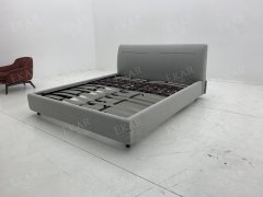 Computer-Embroidered Bed with Horn Button Accents