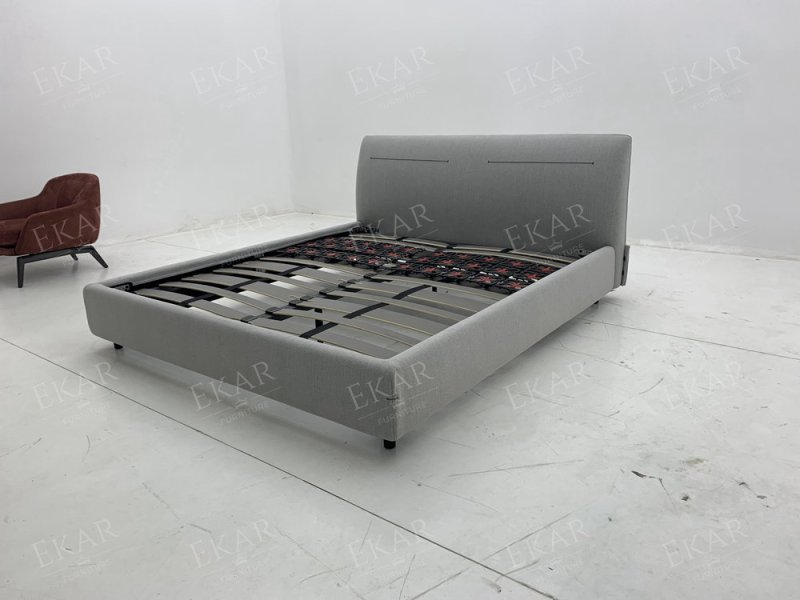 Computer-Embroidered Bed with Horn Button Accents