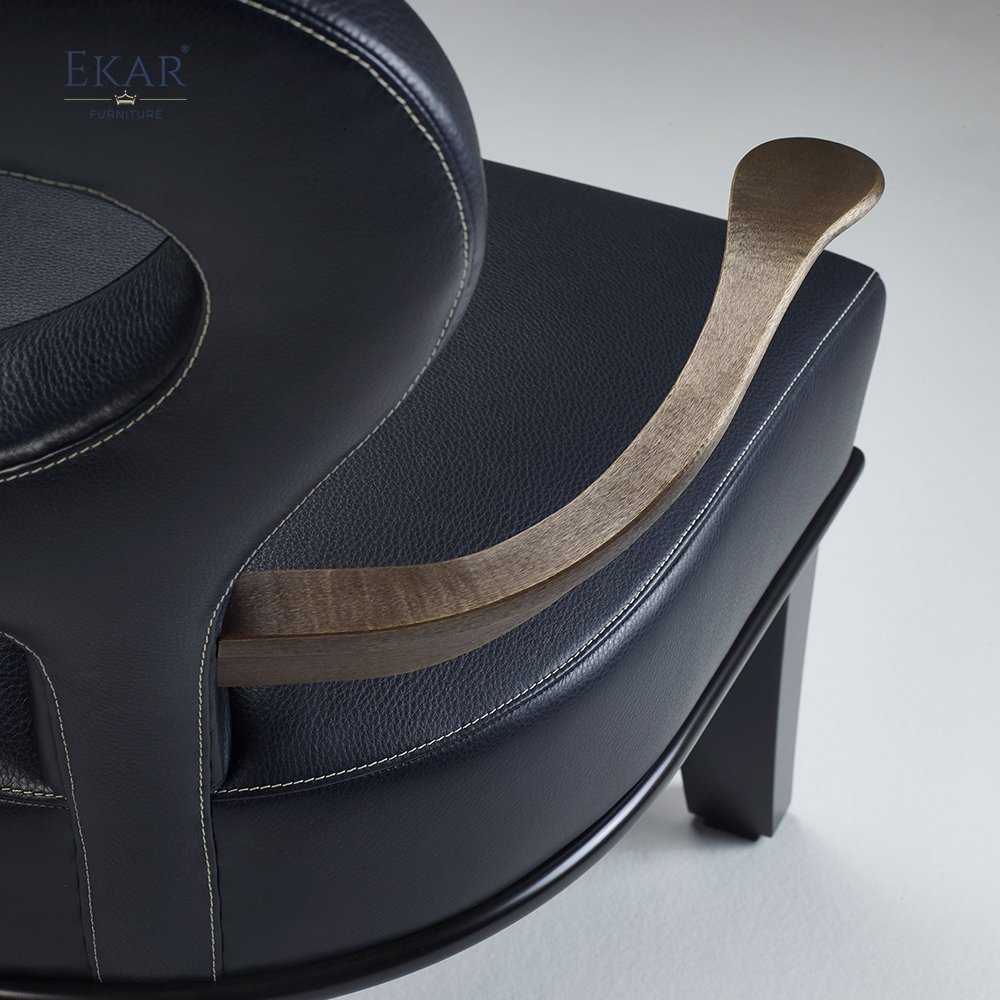 Modern brass arm plush lounge chair with openwork backrest and ergonomic support