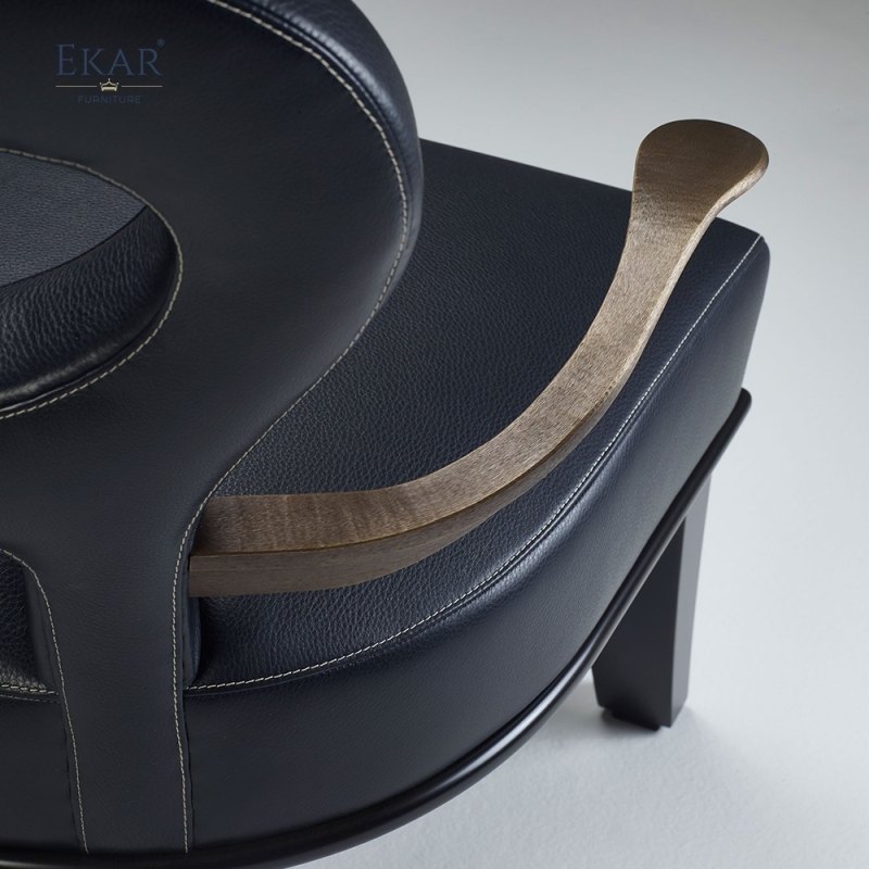 Modern brass arm plush lounge chair with openwork backrest and ergonomic support