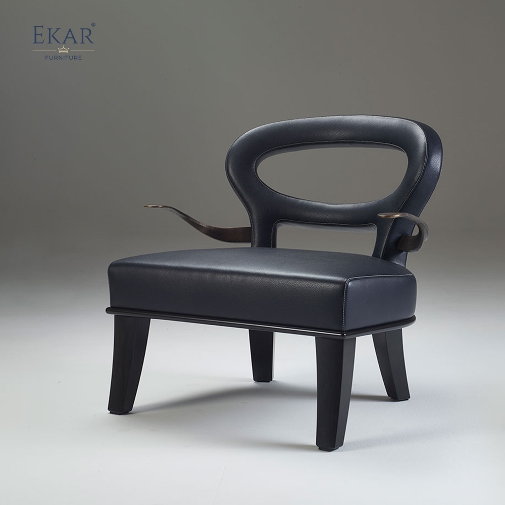 Modern brass arm plush lounge chair with openwork backrest and ergonomic support