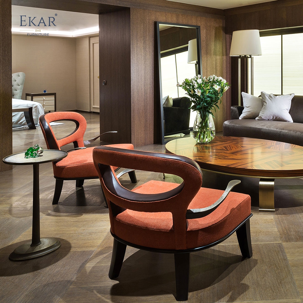 Modern brass arm plush lounge chair with openwork backrest and ergonomic support