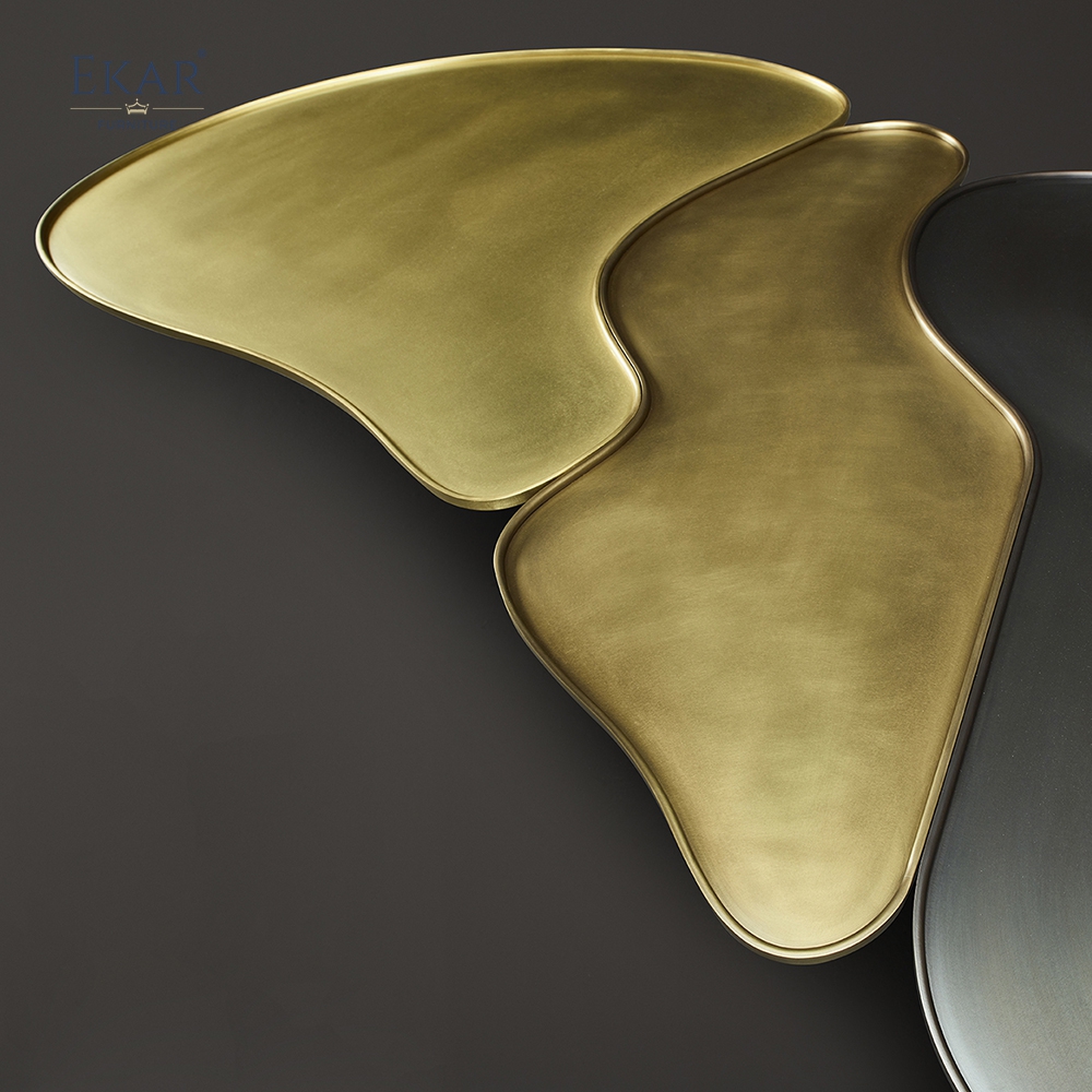 Modern modular coffee table set with metal textured top and brass trim