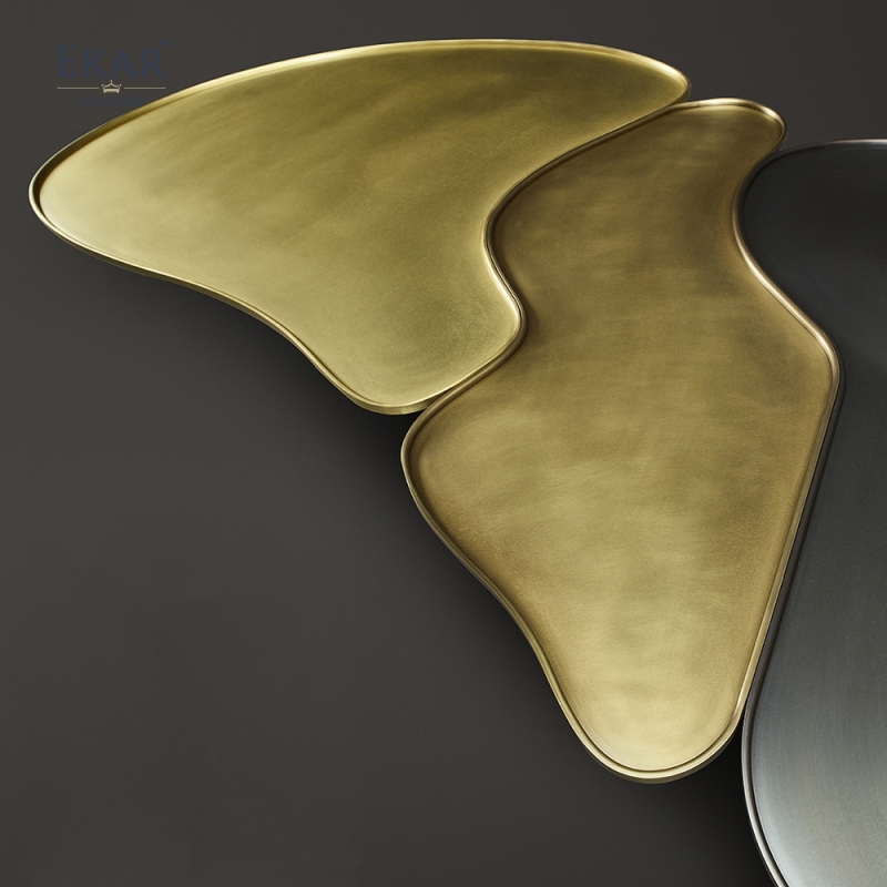 Modern modular coffee table set with metal textured top and brass trim