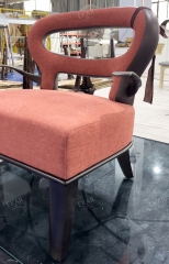 Modern brass arm plush lounge chair with openwork backrest and ergonomic support