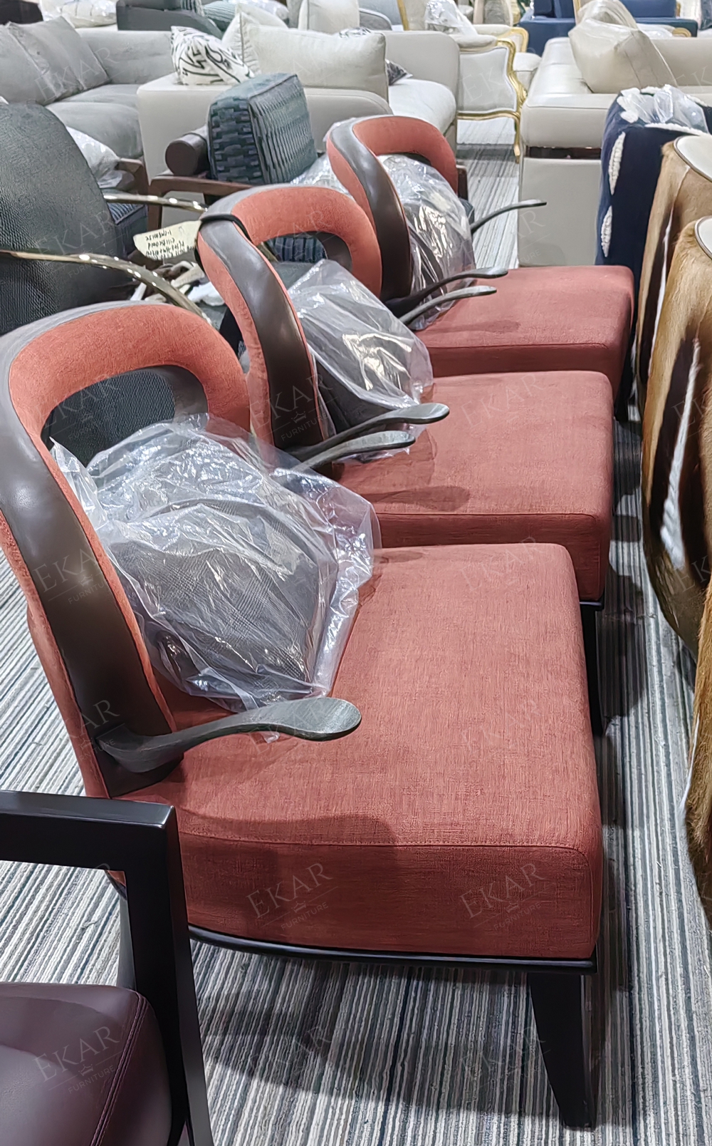 Modern brass arm plush lounge chair with openwork backrest and ergonomic support