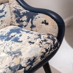 Luxurious modern velvet upholstered chair with gold veneer legs