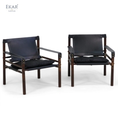 Modern Leisure Chair – Safari-Inspired Leather Sling Armchair for Contemporary Interiors
