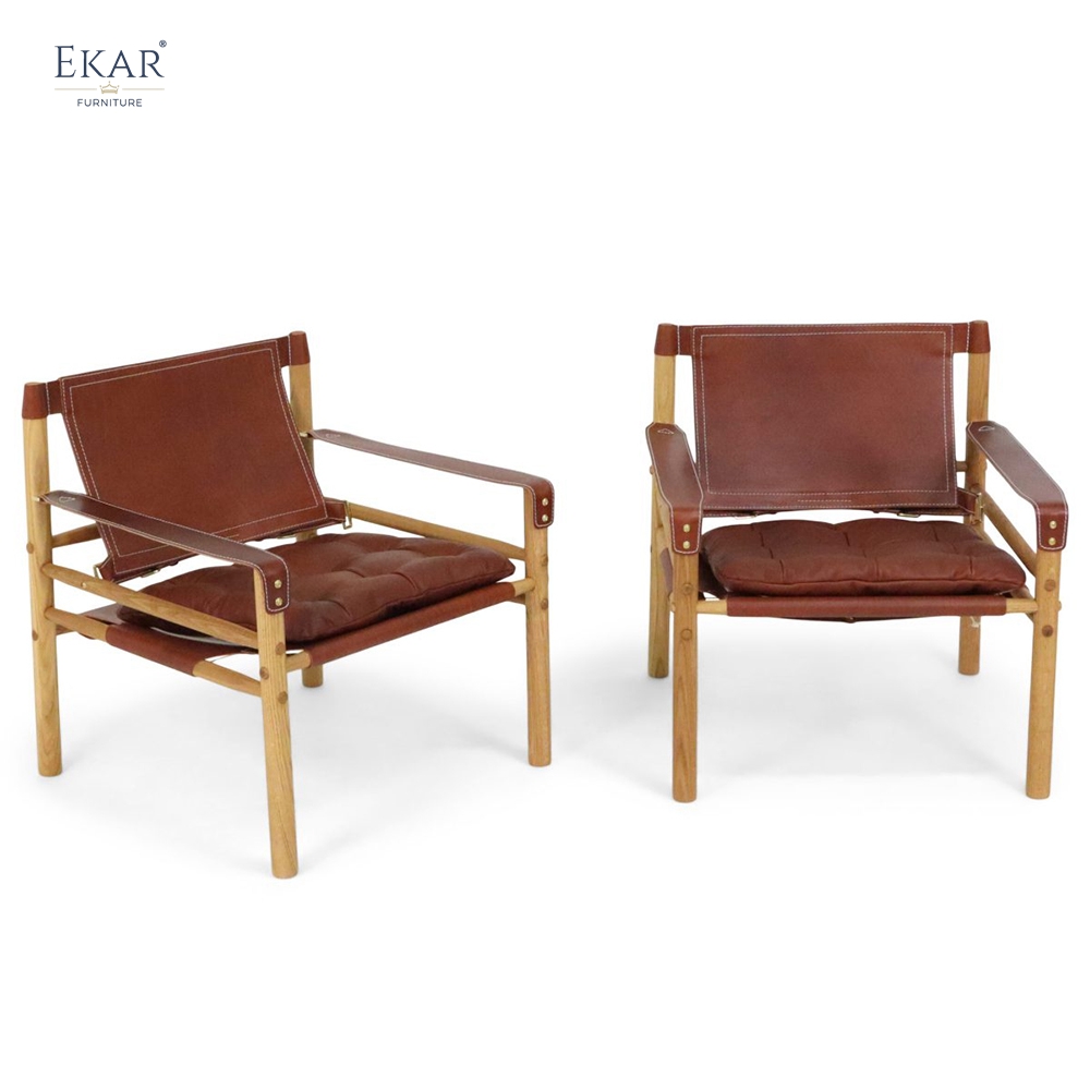 Modern Leisure Chair – Safari-Inspired Leather Sling Armchair for Contemporary Interiors