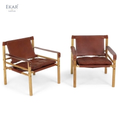 Modern Leisure Chair – Safari-Inspired Leather Sling Armchair for Contemporary Interiors