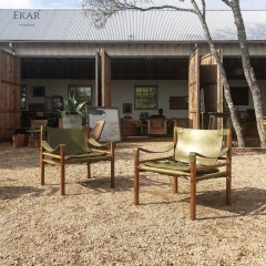 Modern Leisure Chair – Safari-Inspired Leather Sling Armchair for Contemporary Interiors