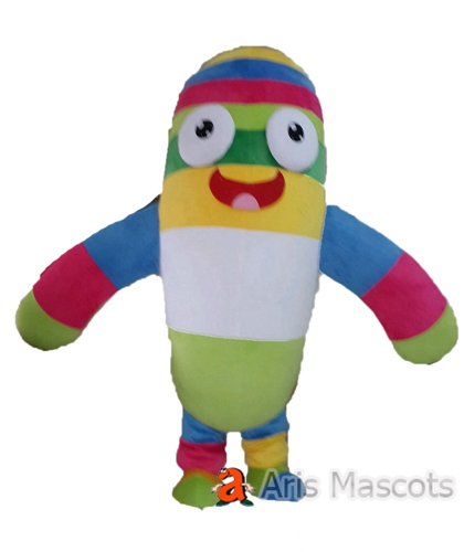 Multicolored plush mascot for drugstore. Mascot colored pill cosplay adult fancy dress for pharmacy