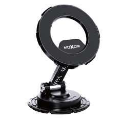 Magnetic holder for dashboards of different slopes