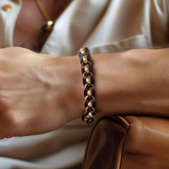 WOVEN Trendy bracelet in rose gold matte stainless steel interwoven with brown leather, adjustable from 20 - 22 cm