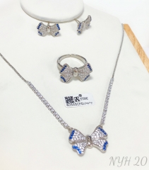 Jewelry set gold/silver bow