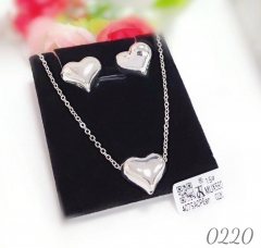 Silver earrings necklace glossy heart model