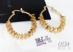 Gold earrings irregular