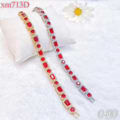 Gold/silver red zircon irregular shape