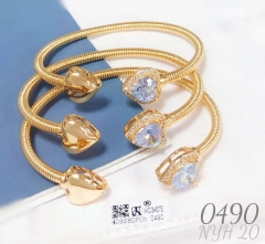 Gold bracelet set with artificial gemstones