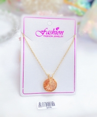 Gold-tone necklace with orange zircon