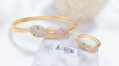 Gold bracelet and ring set with artificial gemstone