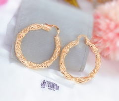 Double twist hoop gold earrings