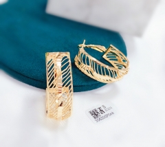 Irregular gold hollow earrings