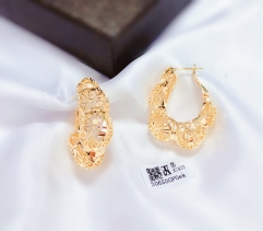 Irregular gold hollow earrings