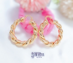 Double twist hoop gold earrings