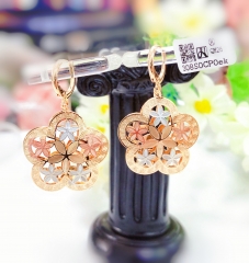 Hollow flower shape pendant earrings