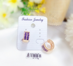 Purple zircon gold earrings