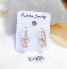 Simple gold pendant earrings