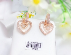 Hollow heart style earrings