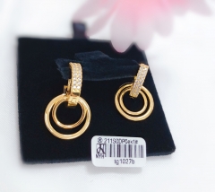 Hollow round gold earrings