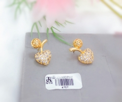 Gold heart style earrings