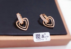 Hollow heart style earrings