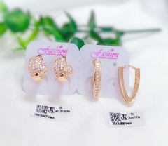 White zircon gold earrings